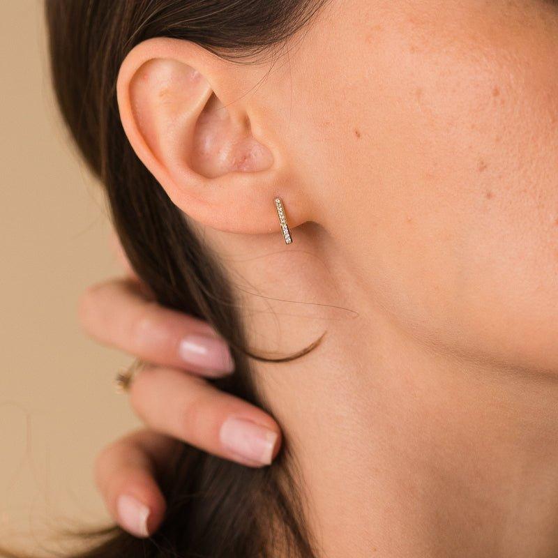 She did earrings