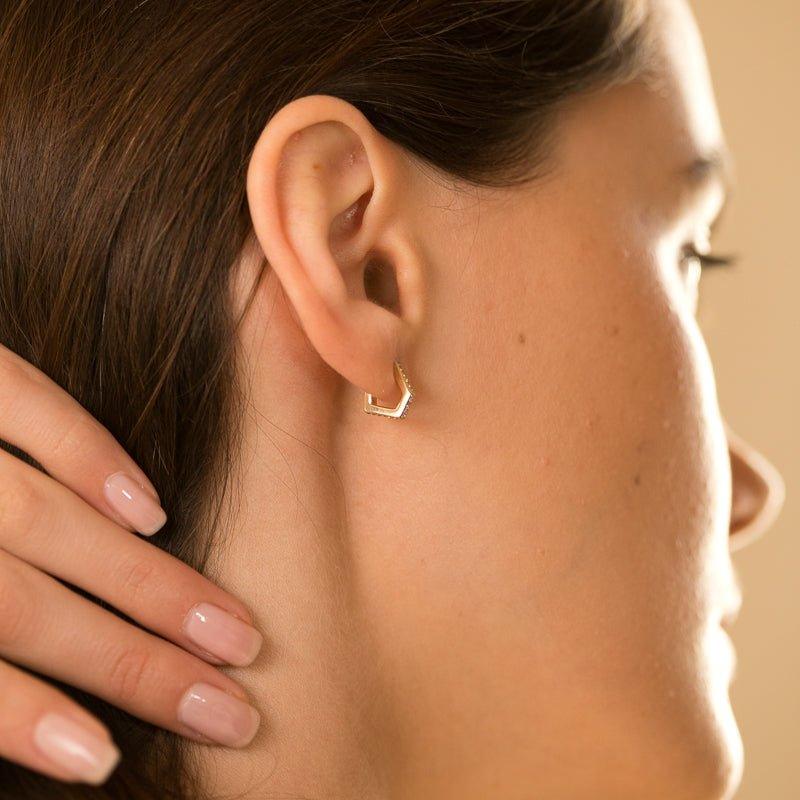 She did earrings