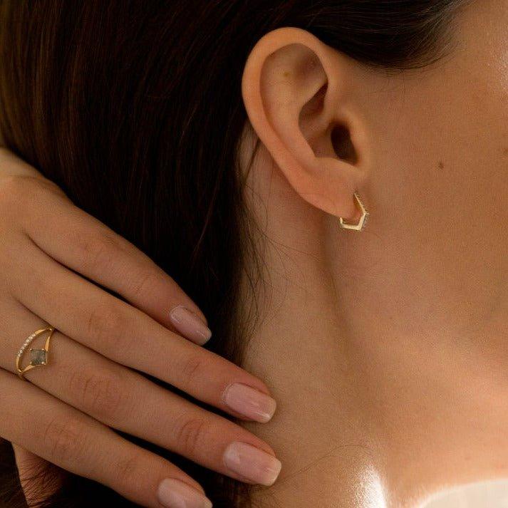 She did earrings
