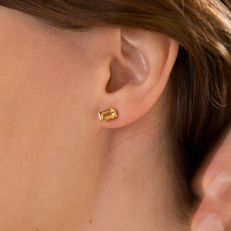 It’s a long story baguette stud earrings