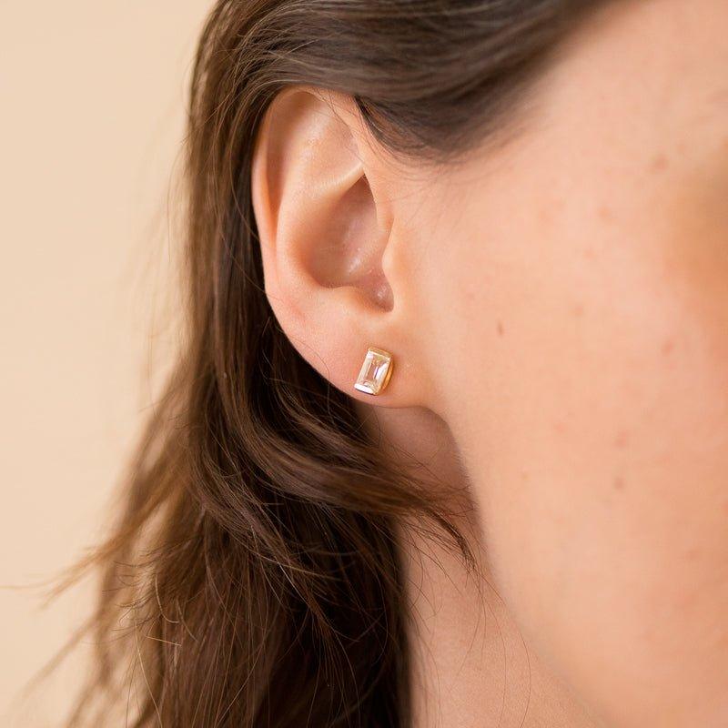 It’s a long story baguette stud earrings