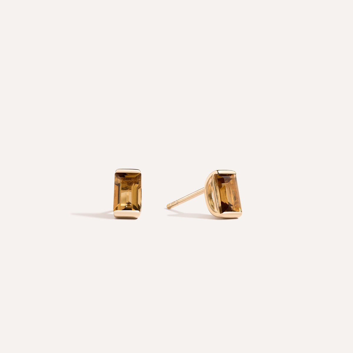 It’s a long story baguette stud earrings